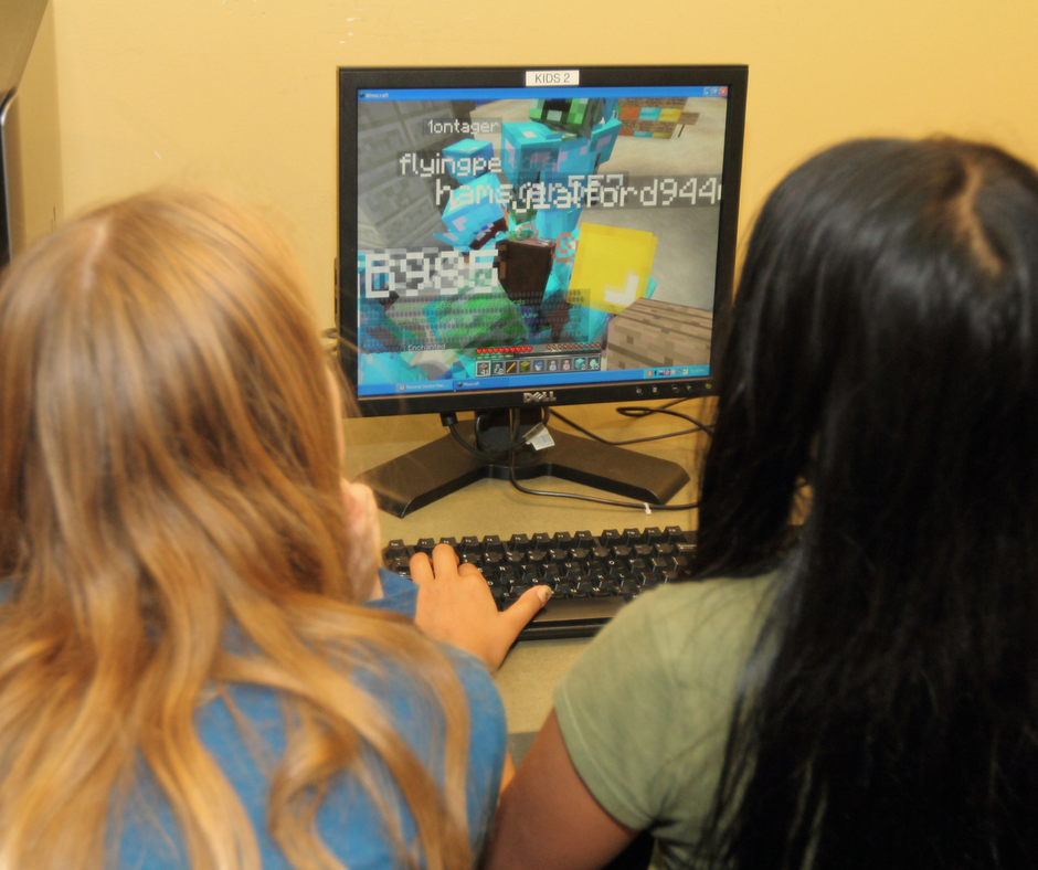 Kids playing on computer